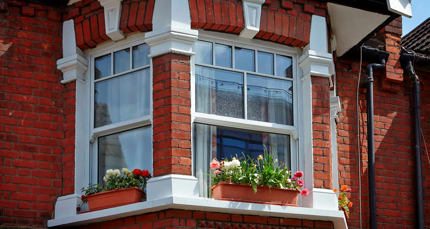 vertical sliding windows cost New Milton