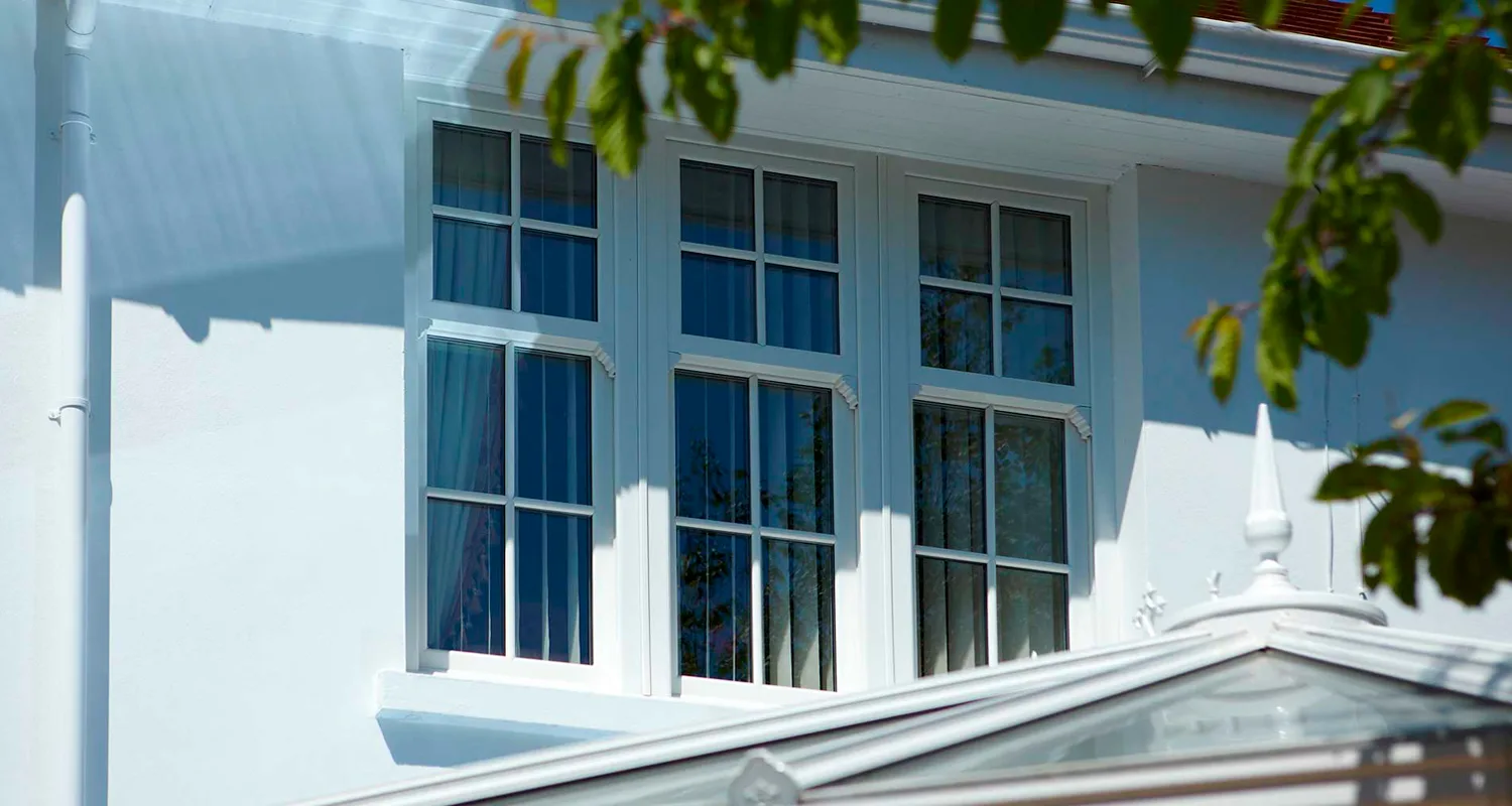 vertical sliding windows cost New Milton